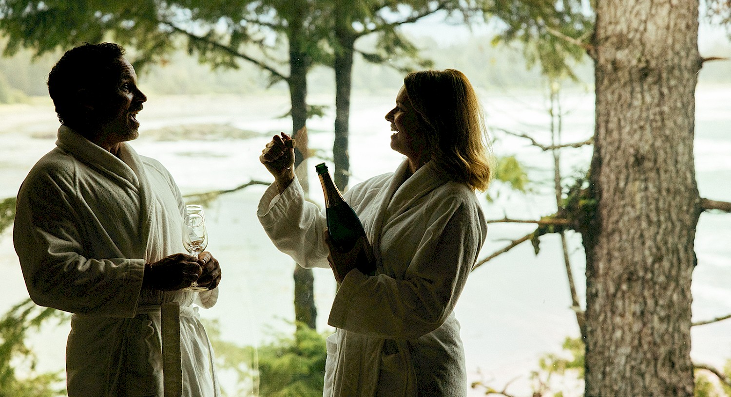 Erin and Shawn celebrating with bubbles by Jeremy Koreski