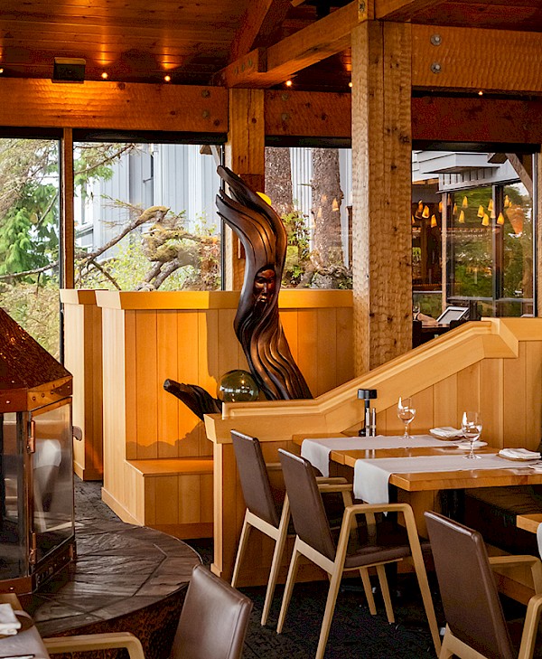 Interior of The Pointe Restaurant with coastal-inspired carvings and wood detailing